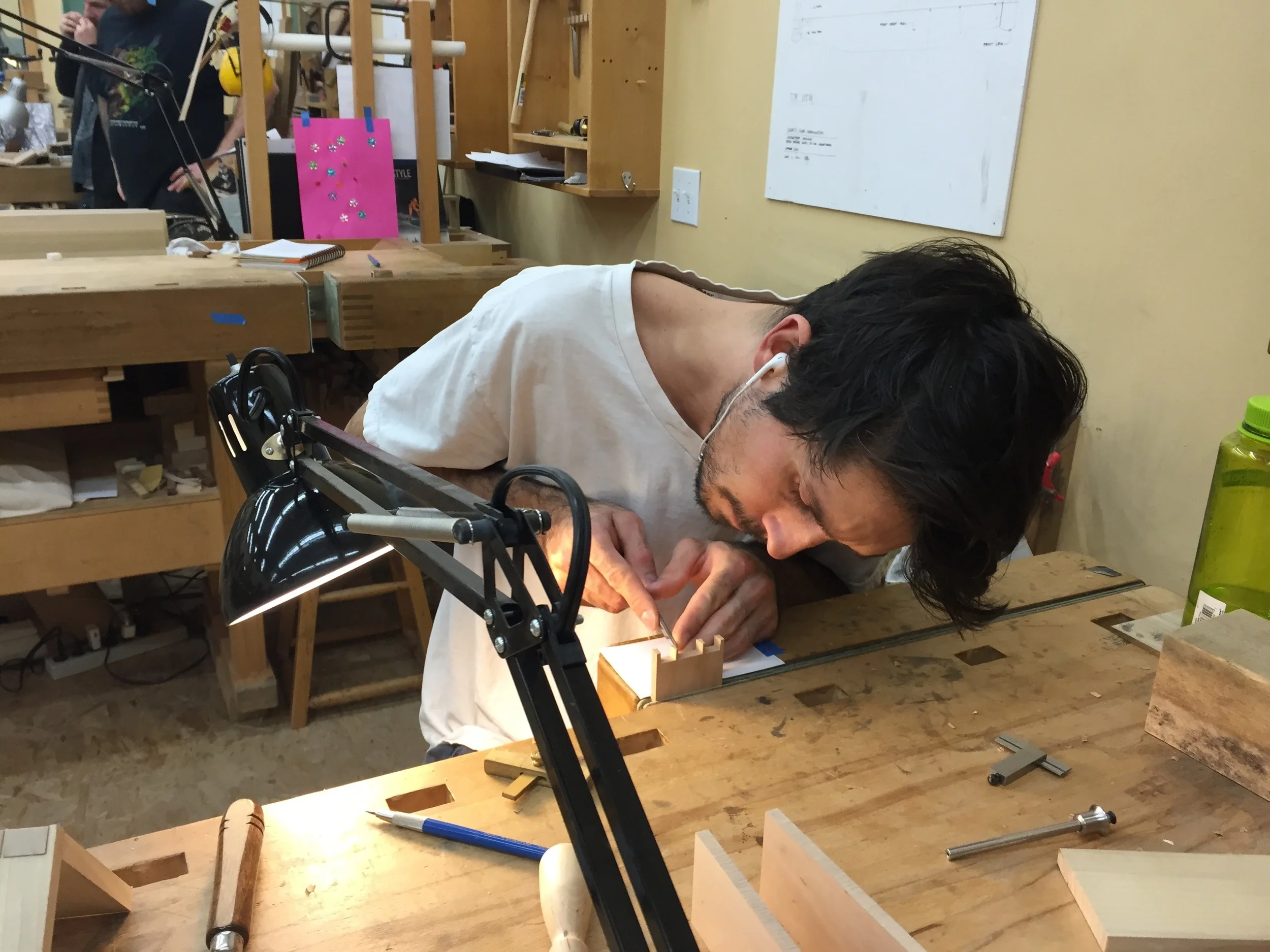  Jesse, my new benchmate this session, working on a small box in Pear  