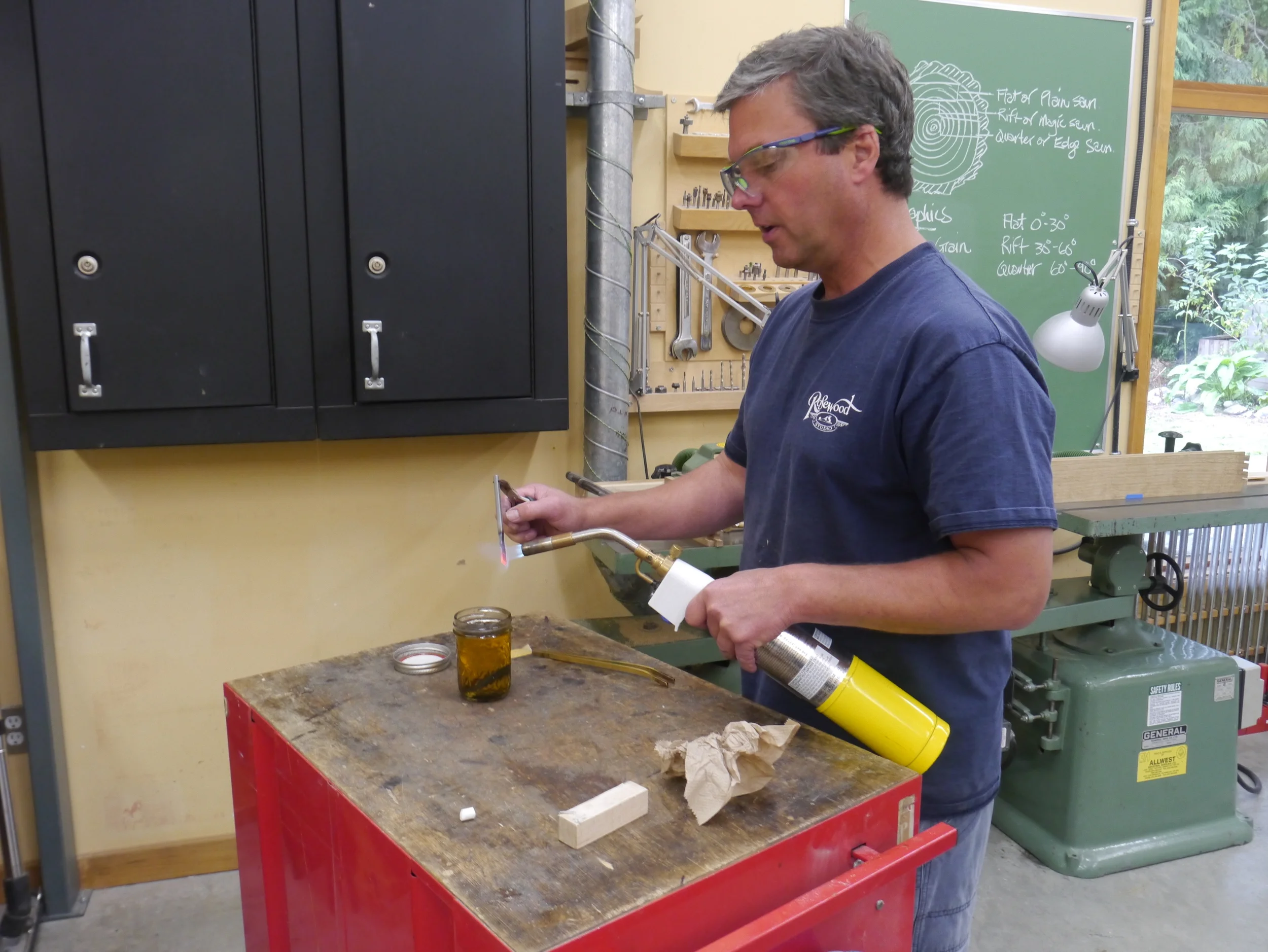 Mike hardening his chisel